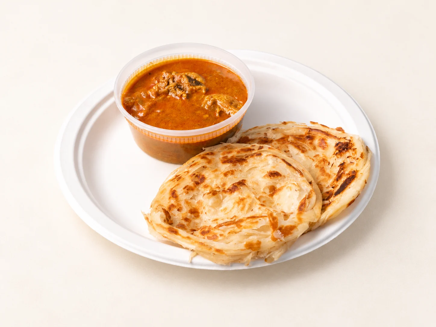 Parotta with chicken curry